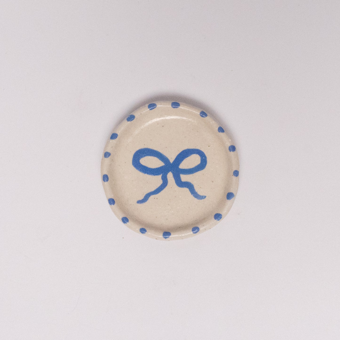 Platito moño azul
